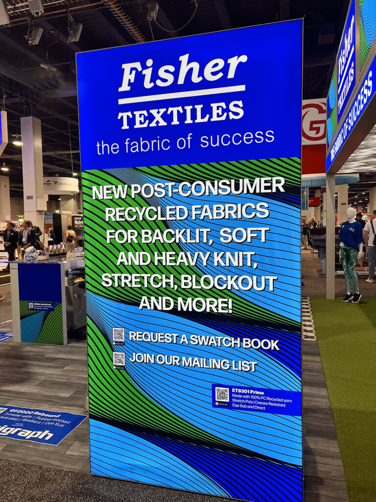 A large vertical banner sign for Fisher Textles, made from ET8301 Prime Backlit.