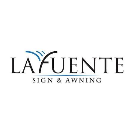 Logo featuring the text "LA FUENTE" in bold black with a blue wave element and smaller text "SIGN & AWNING" below.